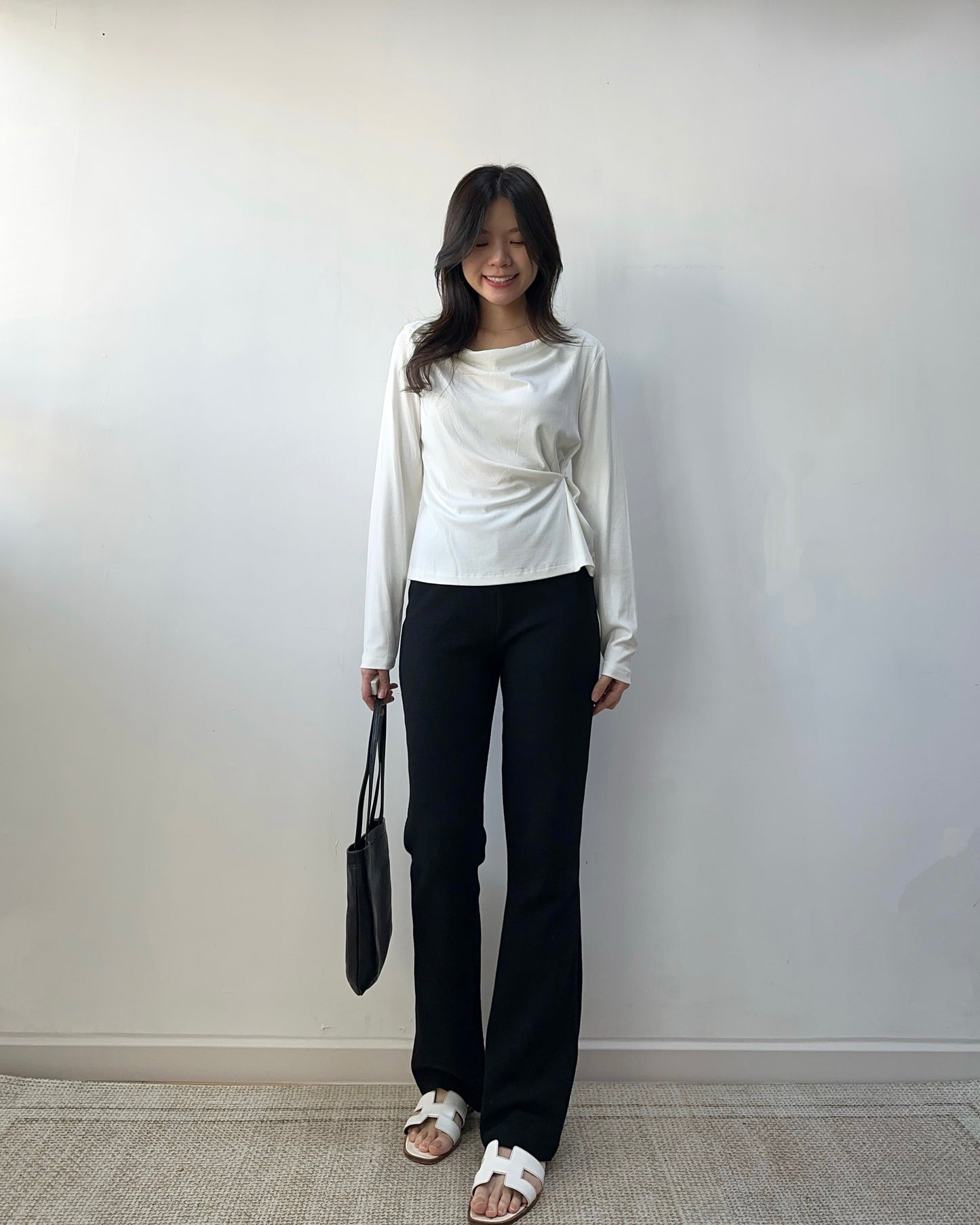 暗羅紋修腳微喇叭褲